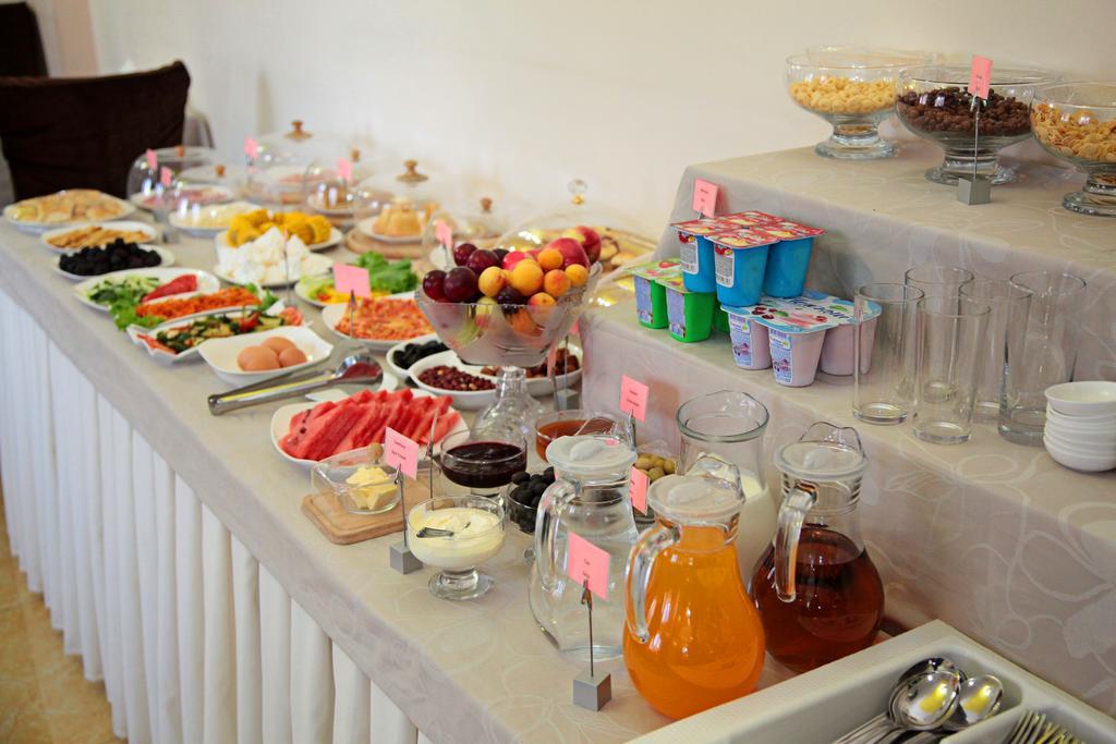 Voyage Hotel Bishkek Bagian luar foto