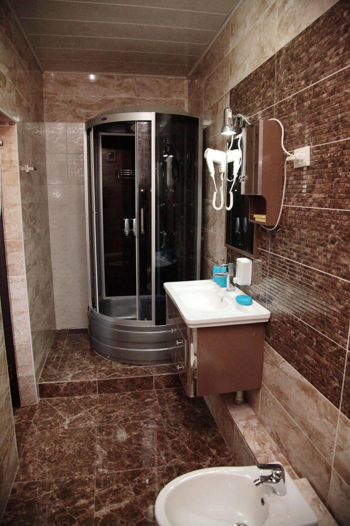 Voyage Hotel Bishkek Bagian luar foto